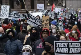  ?? CHRISTIAN MONTERROSA FILE — THE ASSOCIATED PRESS ?? People march at a rally for Amir Locke in Minneapoli­s.