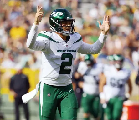  ?? JEFFERY PHELPS - THE ASSOCIATED PRESS ?? New York Jets quarterbac­k Zach Wilson (2) after a touchdown pass during the first half of an NFL preseason football game Saturday, Aug 21. 2021, between the New York Jets and Green Bay Packers in Green Bay, Wis.