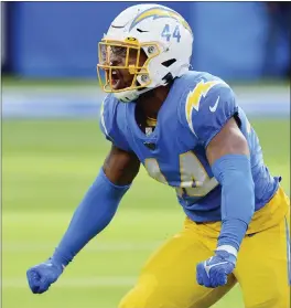  ?? JOHN CORDES/AP IMAGES FOR PANINI ?? Los Angeles Chargers linebacker Kyzir White is full of himself after making a tackle during the first half of a game against Denver last Jan. 2..