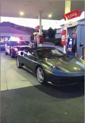  ?? Photo courtesy of SCV Sheriff’s Station ?? Deputies recover a Ferrari on Saturday morning and arrest one man following reports of the stolen vehicle from a Santa Clarita Valley home.