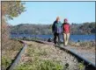  ?? TANIA BARRICKLO — DAILY FREEMAN FILE ?? Jack and Lin Fagan of Kingston walk in November 2017 where the Kingston Point Rail Trail is to be created.