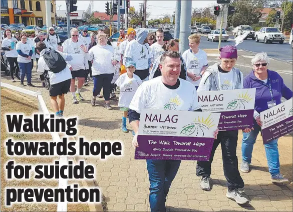  ?? PHOTO: SUPPLIED ?? Member for Dubbo Dugald Saunders (left) and NALAG’S Trudy Hanson (right) helped lead the 2019 Walk Towards Hope across the L.H. Ford Bridge in support of suicide prevention, awareness and support.