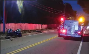  ?? Joseph B. Nadeau photo ?? Emergency crews and personnel responded to the scene of this motorcycle crash on Friday night, which claimed the life of John Merrifield, 51.