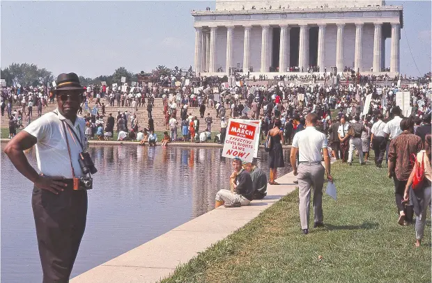  ?? MAGNOLIA PICTURES VIA THE ASSOCIATED PRESS ?? People gather at the Lincoln Memorial for the March on Washington, featured in the film I Am Not Your Negro. In Raoul Peck’s Oscar-nominated documentar­y, James Baldwin’s searing observatio­ns on race and America are resurrecte­d, and his words could hardly be more urgent.