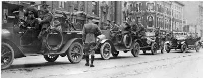  ??  ?? Above: A tumultuous day ends with specials, North West Mounted Police officers, and federal troops attempting to keep the peace, June 21, 1919.