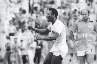  ?? Barton Silverman/New York Times 1975 ?? Pelé reacts to a goal during his debut game with the New York Cosmos, at Randalls Island Stadium on June 15, 1975. The three-time World Cup champion died at age 82 on Thursday.