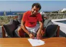  ?? FC ?? Mohamed Salah signing his new contract last year. It runs to 2025. Photograph: Liverpool