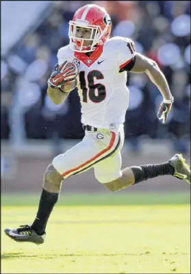  ?? BRANT SANDERLIN / BSANDERLIN@AJC.COM ?? Isaiah McKenzie has five career return touchdowns, four on punts and one on a kickoff. The Bulldogs want to see McKenzie make better decisions and stay healthy in 2016.