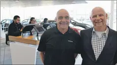  ??  ?? Centennial Nissan of Summerside parts manager Wayne Richard and general manager Dean Gallant are familiar faces ready to welcome friends through the door while Keshia Smith, Emma Khan and Earl Dsouza test out the tablets for customers relaxing at the...