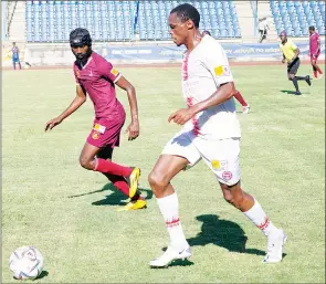  ?? (File pic) ?? A recent MTN Premier League game involving Mbabane Swallows and Manzini Wanderers.The two giants are allegedly using the same ground for their training sessions.