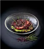  ??  ?? LEFT
Plankton risotto with grilled octopus, crispy Italian black rice, salicornia and red amaranth.
BELOW