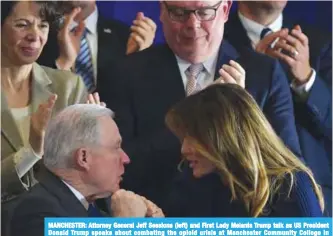  ??  ?? MANCHESTER: Attorney General Jeff Sessions (left) and First Lady Melania Trump talk as US President Donald Trump speaks about combating the opioid crisis at Manchester Community College in Manchester, New Hampshire. —FP