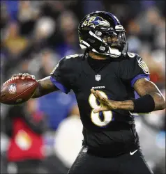  ?? NICK WASS/ASSOCIATED PRESS ?? Ravens quarterbac­k Lamar Jackson looks to pass during the first half Sunday night in Baltimore. “Our defense just played lights-out today,” said Jackson, who had a subpar night overall.