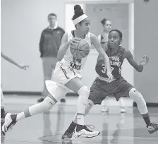  ?? STAFF PHOTO BY ROBIN RUDD ?? East Hamilton sophomore Madison Hayes, with ball, is one of the most highly recruited girls’ basketball players from Hamilton County in several years. The Lady Hurricanes open their season Thursday.