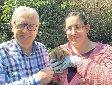  ??  ?? Douglas Chapman MP with Nadia Al-Dujaili, who is hoping to raise funds to reopen her hedgehog hospital.