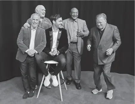  ?? Chris Pizzello / Invision ?? Henry Winkler (left), Terry Bradshaw, Jeff Dye and George Foreman laugh as fellow “Better Late Than Never” co-star William Shatner hams it up during a photo shoot last month to promote the second season of their reality-TV roadshow.