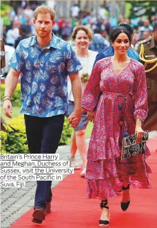  ??  ?? Britain’s Prince Harry and Meghan, Duchess of Sussex, visit the University of the South Pacific in Suva, Fiji.