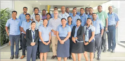  ?? Picture: SUPPLIED ?? The Motibhai Group Suva office staff members with internatio­nal trainer Warwick McCormack from New Zealand, centre, after their SkillUp@ Work training.