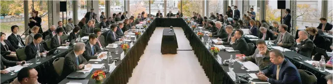  ?? Photo: AFP ?? Delegates gather for a meeting of the World Trade Organizati­on in Ottawa, Canada. Hyper-globalisat­ion had been in retreat since the global financial crisis of 2007-08, with the share of trade in world GDP beginning to decline after that.