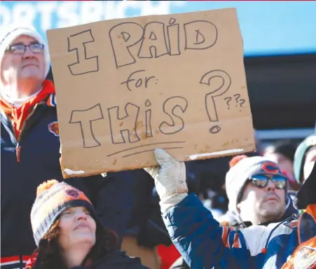  ??  ?? This long- suffering Bears fan has a right to complain, but ownership still takes fans’ passion and loyalty for granted. | NAM Y. HUH/ AP