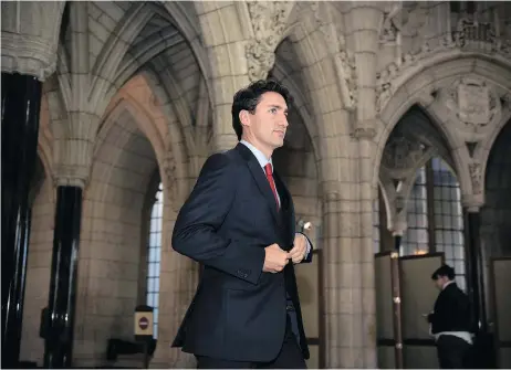  ?? JUSTIN TANG / THE CANADIAN PRESS ?? If Prime Minister Justin Trudeau wants to allay suspicions that he is trying to pull a fast one, he should at least say as much, writes Andrew Coyne.