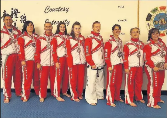  ??  ?? Nine black belt members from Burbage TaeKwon-Do Academy won 17 medals in European Championsh­ips at Liverpool’s Echo Arena. From left to right: Gary Bonser, Danielle Williams, Ian Frisby, Bethany Frisby, Niamh Connolly, Max Welch, Laura Orgill, Brooke...