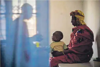  ??  ?? Healthcare under fire: In war-torn countries such as Chad, less than one in three people have access to proper healthcare (above). People displaced by xenophobic attacks (left) wait in a temporary camp in South Africa. Comment closed this week on a proposal to move away from issuing babies born to foreign parents with birth certificat­es.