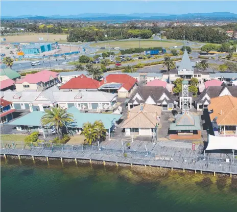  ?? Picture: GLENN HAMPSON ?? Village Square marketplac­e at Hope Island may soon prove a winner for developer John Fish.