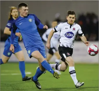  ??  ?? Sean Heaney of Bray Wanderers in action against Ronan Murray of Dundalk.