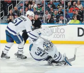  ?? BILL WIPPERT GETTY IMAGES ?? Johan Larsson of the Sabres scores a third-period goal against goaltender Frederik Andersen of the Toronto Maple Leafs at KeyBank Center in Buffalo on Monday. Buffalo won, 5-3.