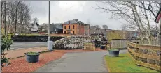  ??  ?? While not in full bloom yet, brightly coloured tubs welcome visitors to Brodick.