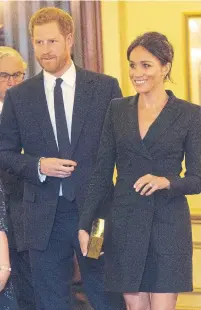  ?? DAN CHARITY WPA POOL/GETTY IMAGES FILE PHOTO ?? This tuxedo dress caused the search term “Meghan Markle skinny legs” to spike on Google results.