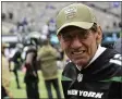  ?? STEVEN RYAN - THE ASSOCIATED PRESS ?? FILE - Former New York Jets quarterbac­k Joe Namath walks the field as the Jets warm up before an NFL football game against the New York Giants in East Rutherford, N.J., in this Sunday, Nov. 10, 2019, file photo.