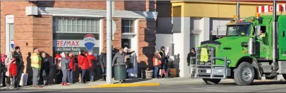  ??  ?? Citizens lined 2nd St. to welcome the hundreds of trucks from all over Alberta which drove in solidarity to protest the federal and the Alberta provincial government in what protesters believe is the unwillingn­ess or their inability to kickstart the energy sector, build pipelines to ship product south and across the country and some controvers­ial bills.