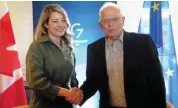  ?? (AfP) ?? Canadian FM Melanie Joly and EU foreign policy chief Josep Borrell shake hands during G7 FMs’ meeting in Wangels, Germany, on Saturday