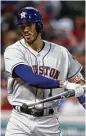  ?? Ron Schwane / Getty Images ?? Carlos Correa isn’t happy with a bases-full strikeout against Indians reliever Andrew Miller.