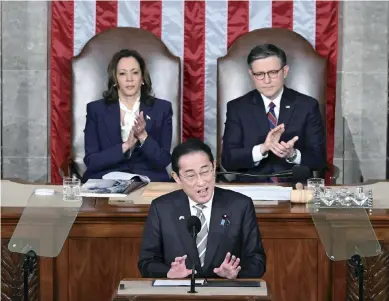  ?? The Yomiuri Shimbun ?? Prime Minister Fumio Kishida addresses a joint session of the U.S. Congress in Washington on April 11.