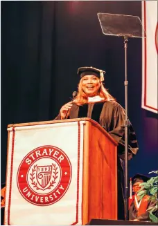  ?? KATE BATEMAN, STRAYER UNIVERSITY ?? Queen Latifah delivers the Strayer University commenceme­nt speech at Capital One Arena in Washington, D.C., on June 23.