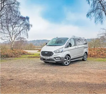  ??  ?? CHARGING AHEAD: the Tourneo Custom is a plug-in hybrid that carries eight people.