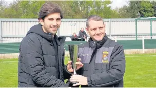  ?? James Eastup ?? Runcorn Linnets striker Freddie Potter ( left) receives the Player Of The Month award for March from League chairman Paul Lawler.