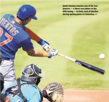 ?? AP ?? Mark Vientos smacks one of his two homers — a three-run jobber in the fifth inning — in Mets rout of Marlins during spring game on Saturday.