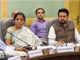  ?? —PTI ?? Union finance minister Nirmala Sitharaman with MoS Anurag Thakur attend a preBudget meeting in New Delhi on Tuesday.