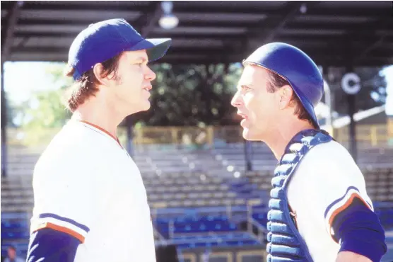  ??  ?? Tim Robbins, left, and Kevin Costner in the classic baseball movie Bull Durham, which featured a long list of clichés.