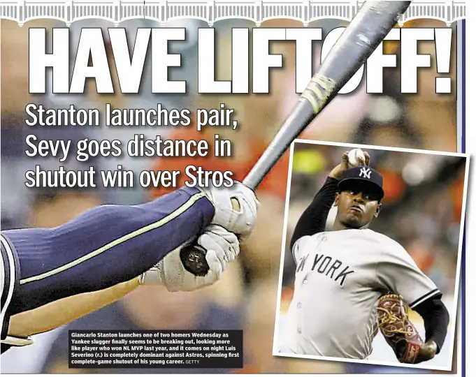  ?? GETTY ?? Giancarlo Stanton launches one of two homers Wednesday as Yankee slugger finally seems to be breaking out, looking more like player who won NL MVP last year, and it comes on night Luis Severino (r.) is completely dominant against Astros, spinning first...