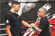  ?? Virendra Saklani/Gulf News ?? Hamzah Sheeraz with trainer Ricky Funez.