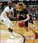  ?? RICHARD W. RODRIGUEZ/TRIBUNE NEWS SERVICE ?? South Carolina's Doniyah Cliney (4) defends as Stanford's Brittany McPhee (12) drives in Dallas on Friday. South Carolina advanced, 62-53.