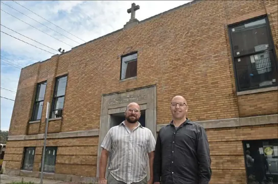  ?? Lake Fong/ Pittsburgh Post- Gazette ?? Brian, left, and Irwin Mendelssoh­n of Botero Developmen­t have bought what used to be St. Joseph's elementary school and are turning it into a commissary kitchen that can hold 30 chefs a month, as well as a lower- level co- working space with room for 150 clients.