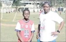  ?? Pic) (Courtesy ?? Mbabane Swallows player Thabang Dlamini
(L) with his father David Dlamini who came to support him during the games.