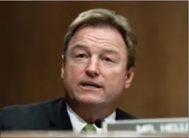  ?? SUSAN WALSH — THE ASSOCIATED PRESS ?? Sen. Dean Heller, R-Nev., asks a question of Treasury Secretary Steven Mnuchin during a Senate Banking Committee hearing on Capitol Hill in Washington. The silent majority may stop Congress from doing anything to address gun violence.