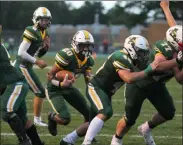  ?? RANDY MEYERS — FOR THE MORNING JOURNAL ?? Amherst running back Torre Weatherspo­on follows the blocking from his offensive line and scores a first quarter touchdown against Firelands on Sept. 6.